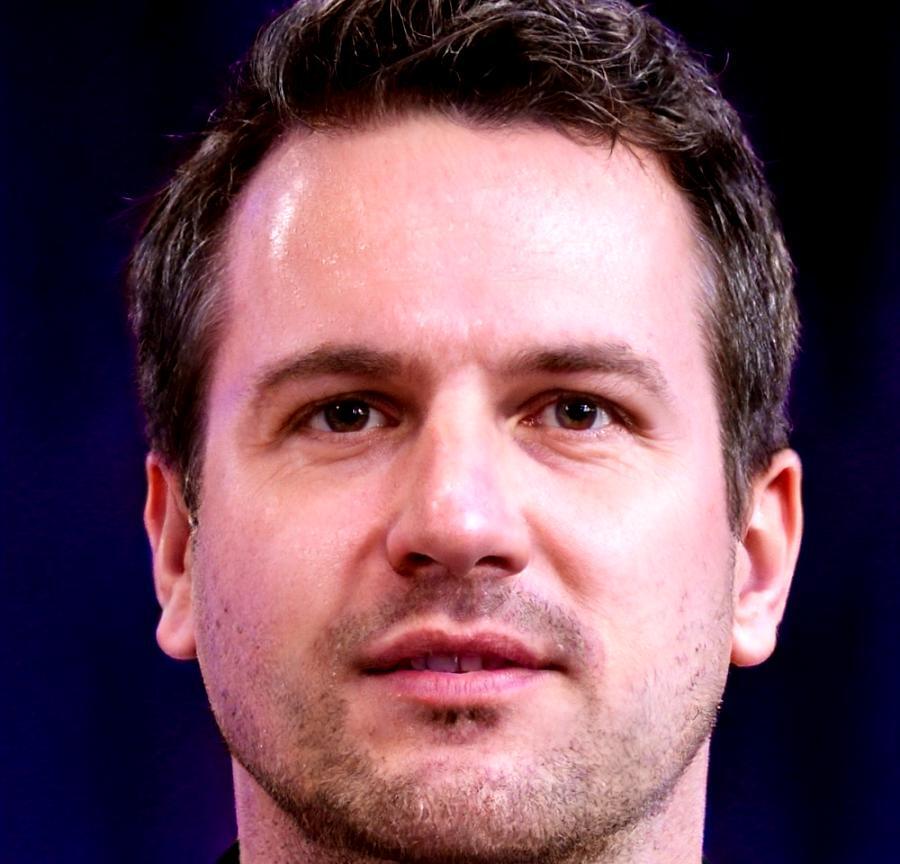 Senior Financial Strategist reviewing budget analysis reports